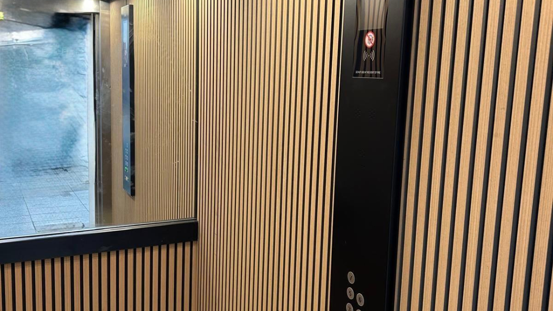 A 1980s lift interior, refurbished for 2026